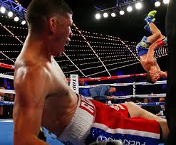 Vasyl Lomachenko doing a backflip after he knocks out Roman “Rocky” Martinez on June 11, 2016 in the Madison Square Garden Arena in New York to win the WBO World Super Flyweight title.
