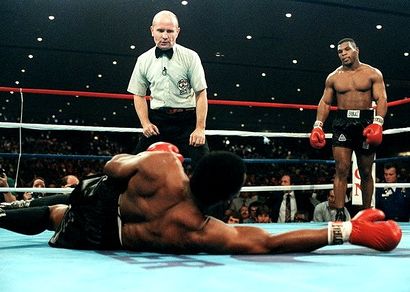 (Mike Tyson knocks out Trevor Berbick in the 2nd round, for the WBC World Heavyweight title, 11/22/1986)