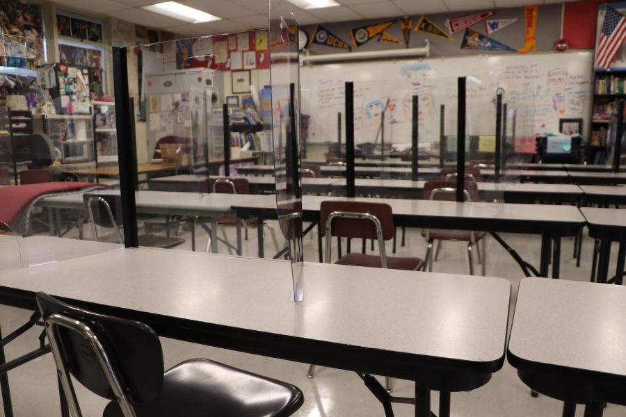 Two-person desks like these will no longer be in classrooms when school reopens August 4.