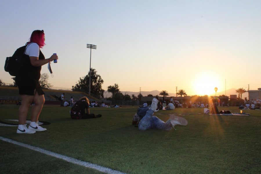 Joselyn+Delgadillo+heads+onto+the+football+field+to+join+her+friends+for+their+Senior+Sunrise+celebration.
