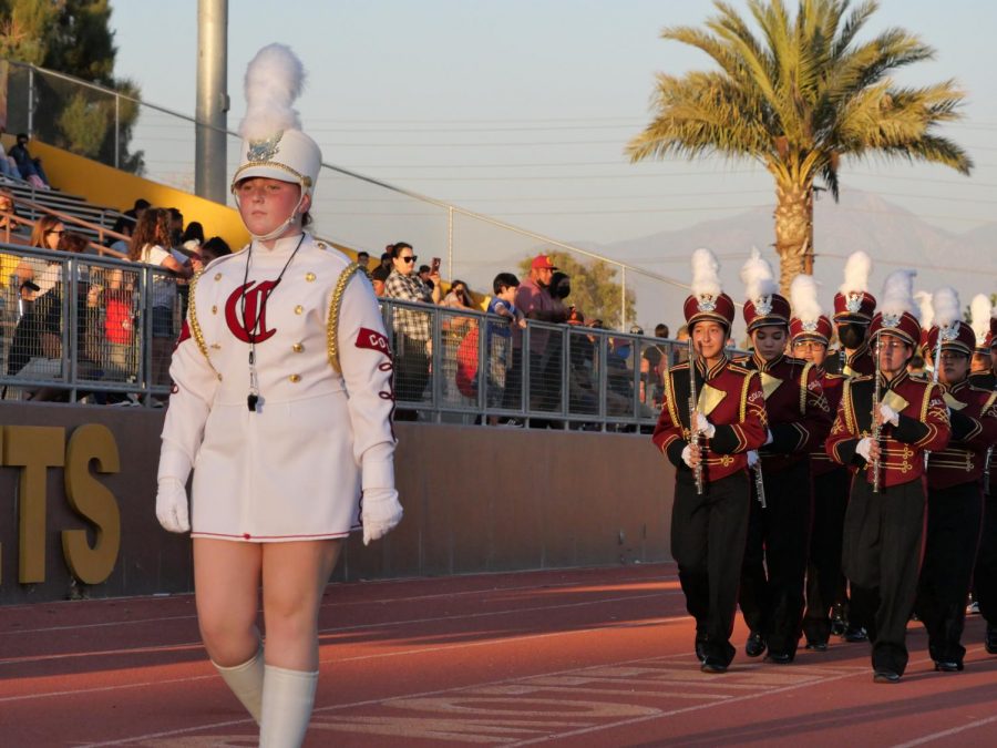 Colton Highs Marching Band makes its dramatic entrance during pregame.