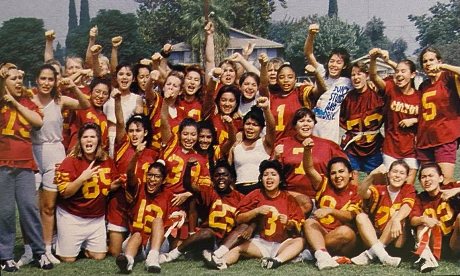 The Senior Powderpuff football team celebrates their triumphant 14-0 victory over the Junior squad during Homecoming week 1993.