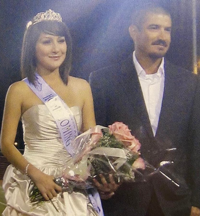As the culminating moment of the 2008 Homecoming halftime show, Alexandra Santoyo was crowned Homecoming Queen. Here she stands with her father shortly after the announcement.