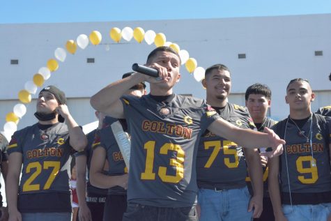 Michael Razo and the Yellowjacket captains get the CHS crowd all fired up at todays Homecoming Pep Rally.