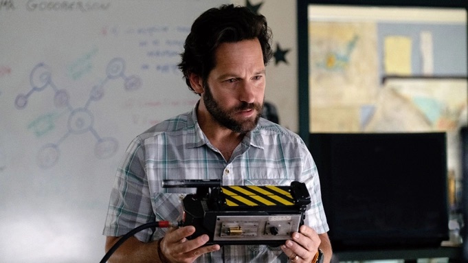 Paul Rudd stares at a ghost trap with reverence in “Ghostbusters: Afterlife.”