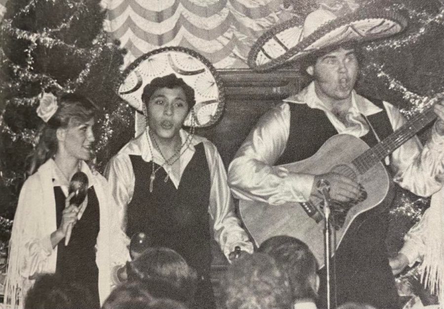 Ms. Roxanne Berch (left) sings Señor Santa Claus with the help of friends Robert Carrasco and Jay Villars at the 1978 Christmas Production.