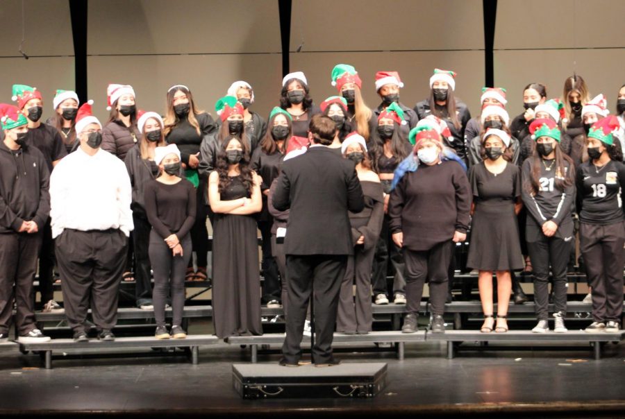 Music Director Kenneth Taber leads the CHS Choir in a performance of All I Want for Christmas is You at the Winter Concert on Dec. 10.