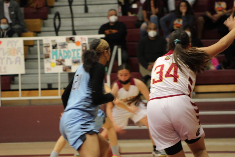 Madison Barrera calls for the ball in the low post versus San Gs Jaylen Russell.