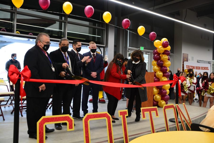During second lunch, the inclement weather moved the ribbon cutting to the indoor stage inside the Cafetorium.