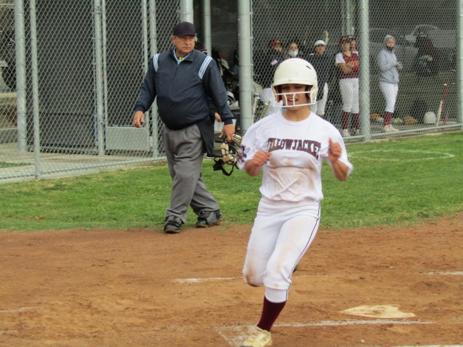 Elena Torrero scores a run in Coltons 14-0 blowout victory over Ontario.