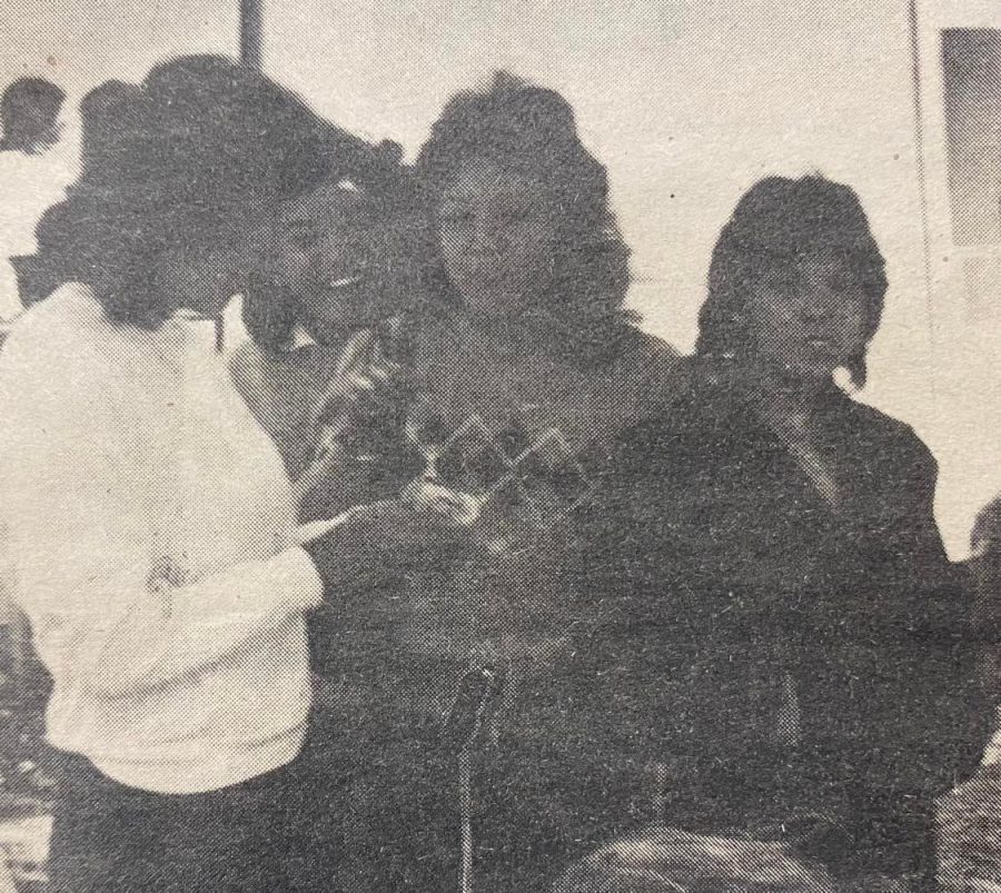Students line up to purchase the 1983-84 Crimson & Gold yearbook. Featured from left: Dolly Jimenez, Gina Zamudio, Toni Jimenez, and Vicky Aboytes
