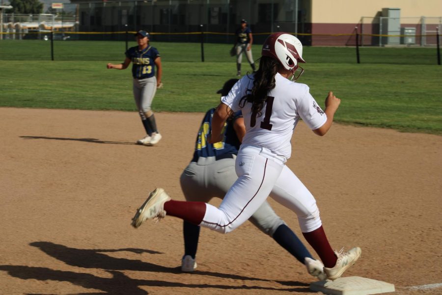 Close call. Zerena Acevedo runs out a ground ball in the fourth inning, almost beating the throw.