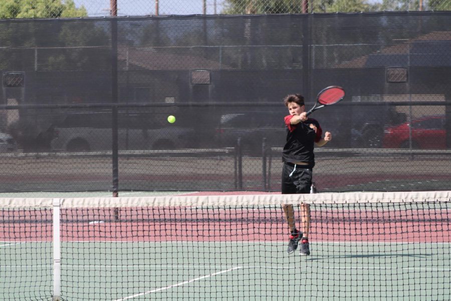 Adrian Colunga smacks a perfect forehand in his 6-0 second set victory against San Gorgonio.