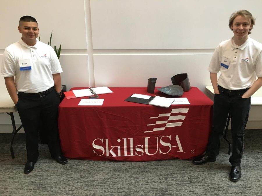 Gabriel Galindo and Ellis Wright-Bradbury represent Colton High with the welding sculptures at the 2022 SkillsUSA state competition in Ontario.