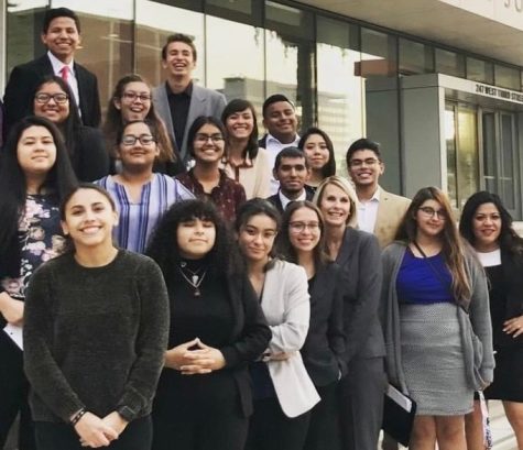 Melissa Rodriguez (bottom row, third from right) served as a coach for the CHS Mock Trial team from 2011-2020. She stands her with the team outside the San Bernardino County courthouse.