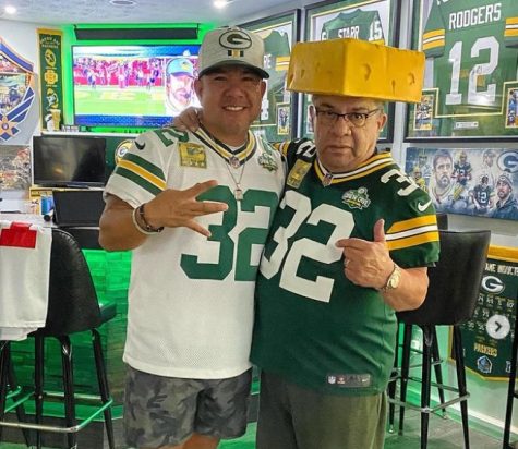 Andrew Lomeli and his father hangout in the Drew Cave to celebrate Fathers Day in June, 2022. His father, Colton resident Bruno Lomeli, is a San Francisco 49ers fan, but had to don the cheesehead after losing a bet.