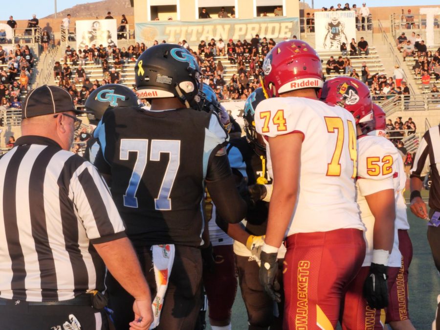 The captains for Colton and Grand Terrace come together for a display of unity before the game.