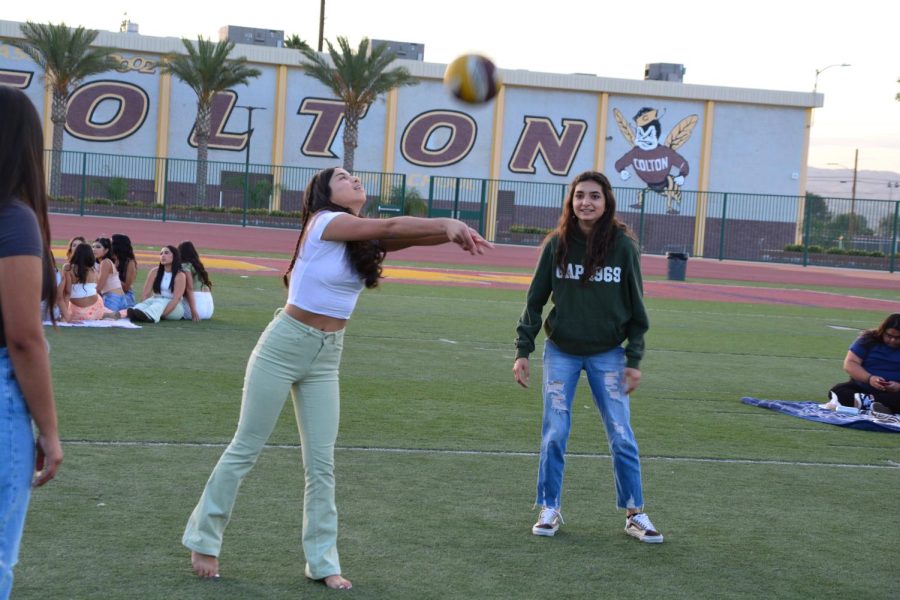 Volleyball star Jennifer Amaral gets in some extra practice with friends.