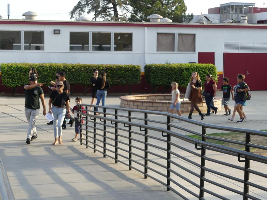 Families make the rounds on campus during Back-to-School Night.
