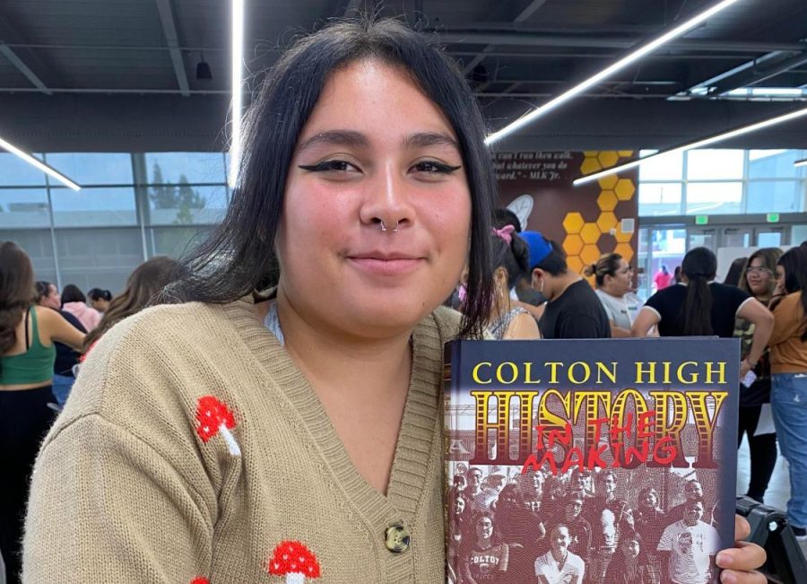 Crimson & Gold Editor-in-Chief Annaleigha Hernandez shows off the 2021-22 yearbook. What will the 2022-23 yearbook look like? $80 early bird special ends on Aug. 27. Get yours today.