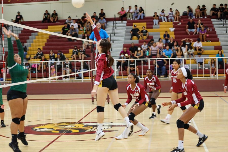 Leslie Venegas gets the jump on the Falcon defender as she sends the ball right back at them.