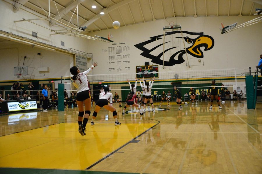 Justeen Robledo serves during the second set against Eisenhower on Sept. 21.