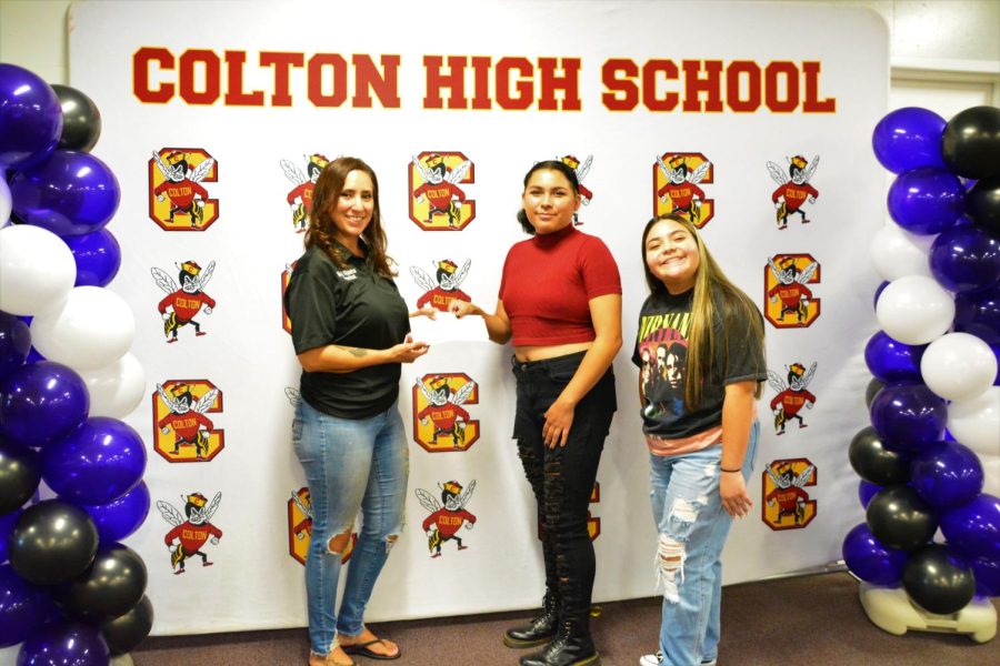 #Aristrong founder Nikki Villalobos presents a donation check to Yearbook Editor-in-Chief Annaleigha Garcia and Photo Editor Sonia Castillo during after school event on Oct. 4.