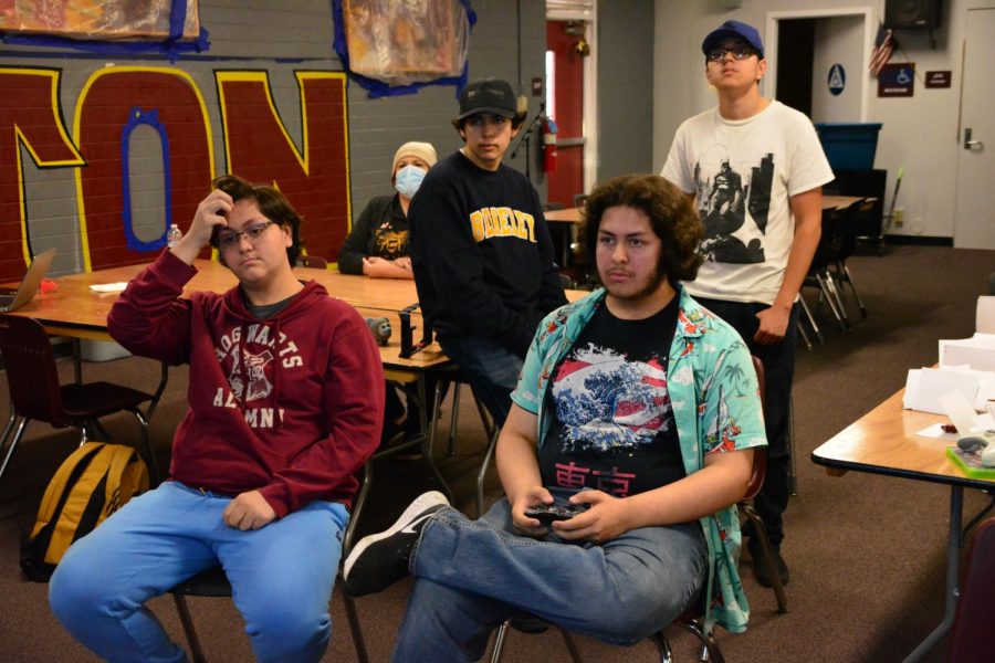 The Yellowjacket eSports team watches intently as Senior Samuel Duran hits the Super Smash Brothers arena to face off against his opponent from Magnolia Science Academy in Carson.