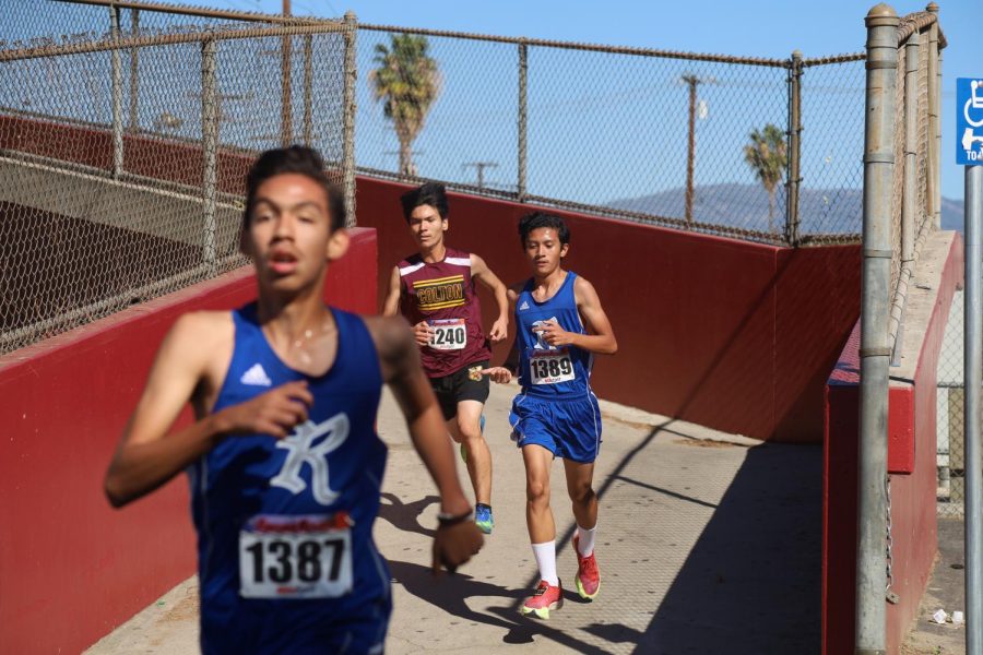 Christopher Acero prepares to make a push past his competition from Rialto High.