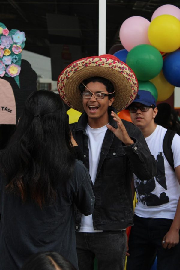 Students enjoy photo ops at the sombrero station.