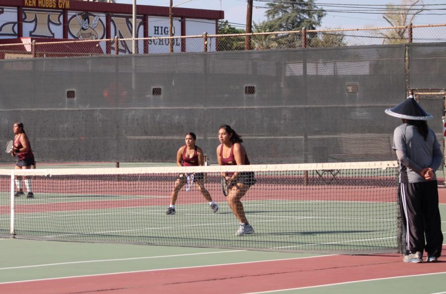 Doubles team of Jasmin Almazan and Cecilia Flores take to the court.