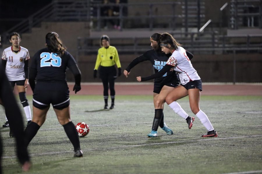 Tiffany Abril fights for possession against Grand Terrace. The depleted Colton roster drops this match 2-0 against local rival.