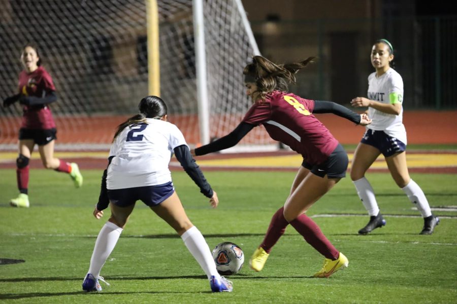 Tiffany Abril keeps the ball away from the Summit defense during Coltons 2-1 loss to the SkyHawks.