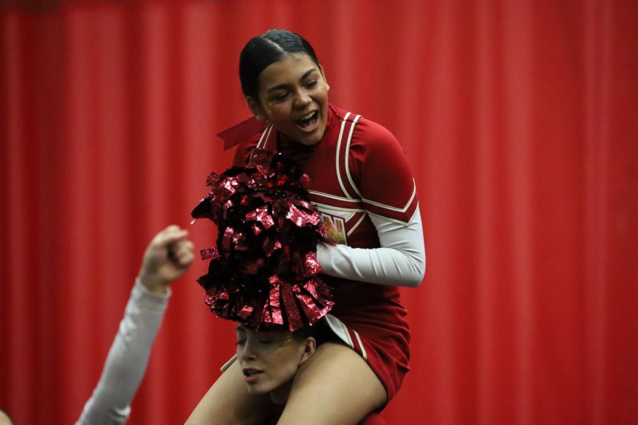 Jennifer Ascencio cheers with excitement during competition teams performance.
