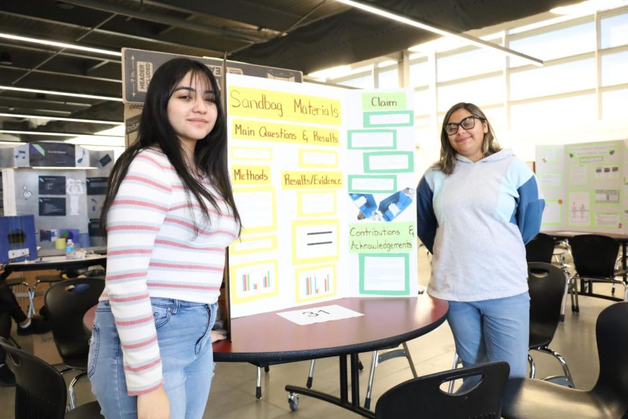Sophomores+Alyssa+Aguirre+and+Addyson+Castro+present+their+science+fair+project+about+water+stoppage+at+the+2023+CJUSD+District+Science+Fair.