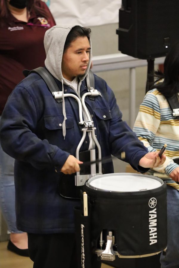 Victor Vasquez leads the drumline at the pep rally, getting the future Yellowjackets hyped up with their first taste of CHS traditions.