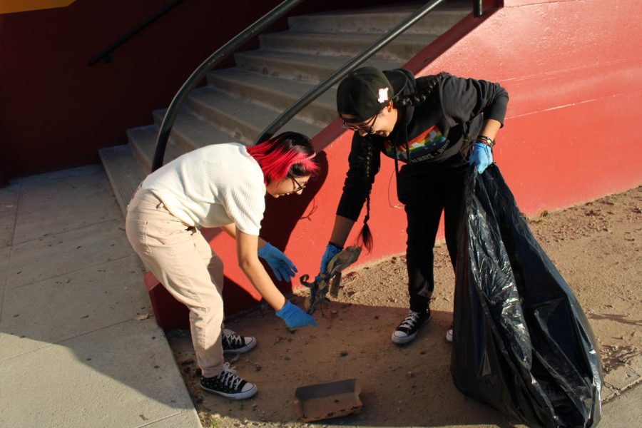 Eco-Friendly Club members help improve the campus cleanliness and have fun doing it.