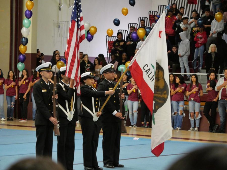 The ROTC Color Guard led off the rally with their presentation of flags as Vivian Guevara sang the National Anthem.