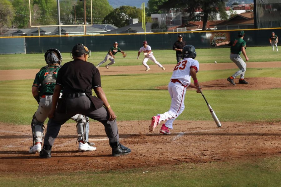 Andrew Montes gets one of his 3 hits during the first inning against Poly Riverside.