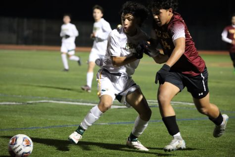 Miguel Marcelo battles for the ball against Eisenhower on Jan. 18. He will lead the Yellowjackets into battle against the Palm Desert Aztecs in round 1 of the CIF playoffs on Feb. 9 at 5 p.m.