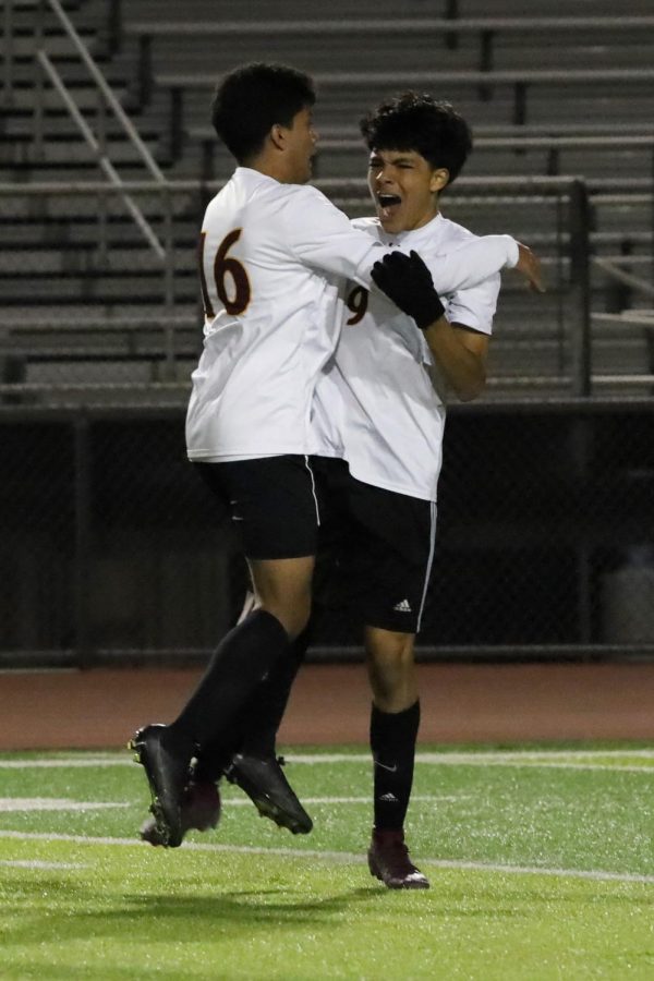 Yahir Rodriguez and Luis Benitez celebrate Rodriguezs chip shot goal that put Colton ahead of the Spartans for good, 2-1.