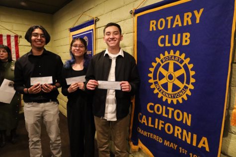 Andrew Diaz, Angela Santana (BHS), and Matthew Duran show off their winnings in the annual Rotary Club 4-Way Speech Competition.