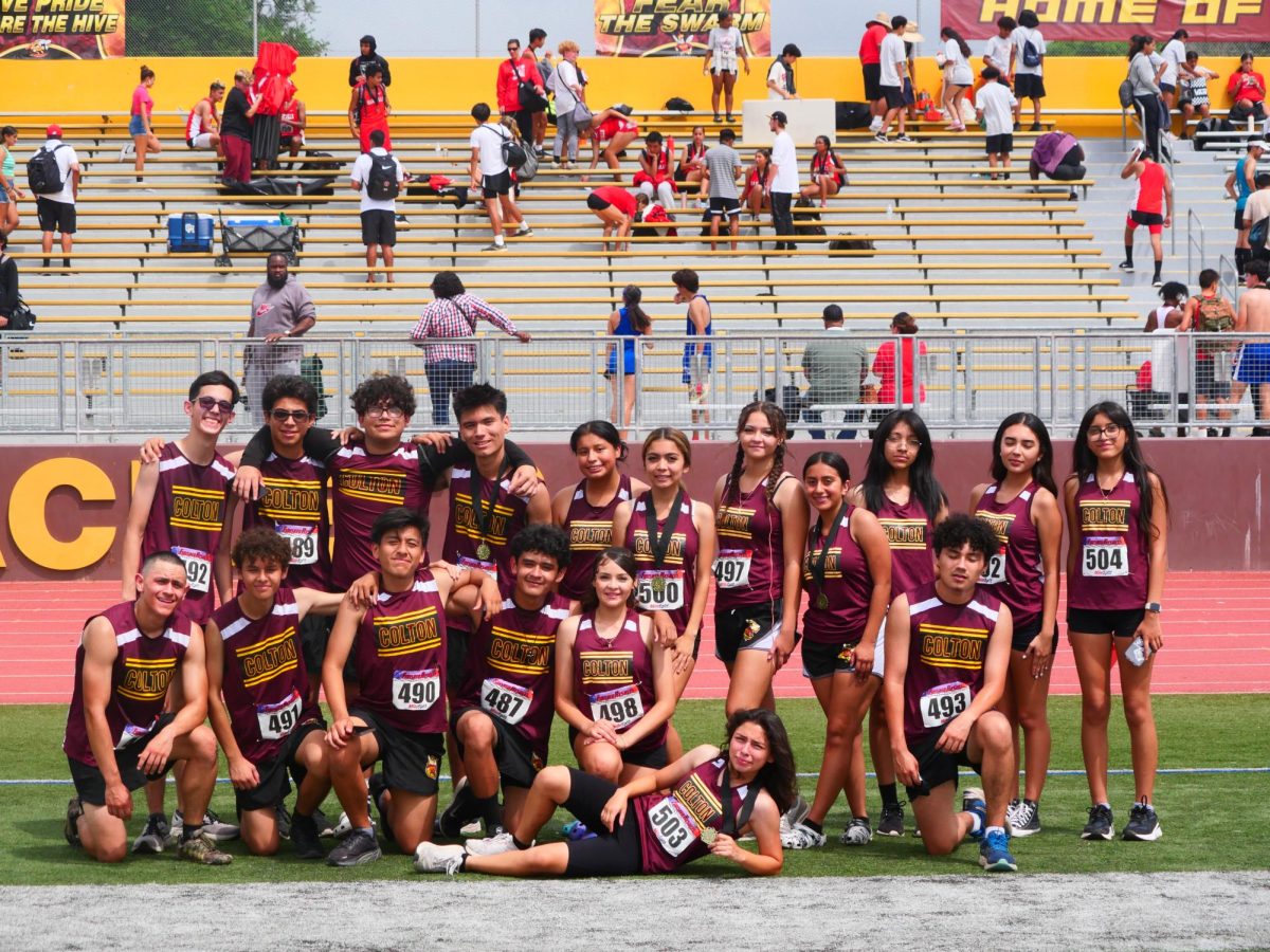 The Colton High Cross-Country team enjoys their outstanding day at SWARM. The team had three top 15 finishers. The junior girls took second place overall in their race. And all the new runners finished their first official 3.1 mile race.