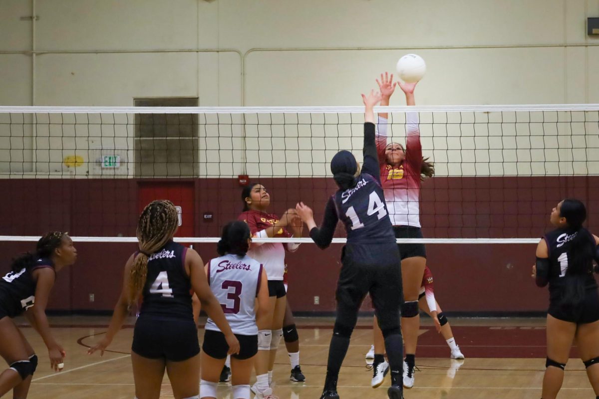 Amy Perez gets the block against Fontana during the third set on Aug. 29.