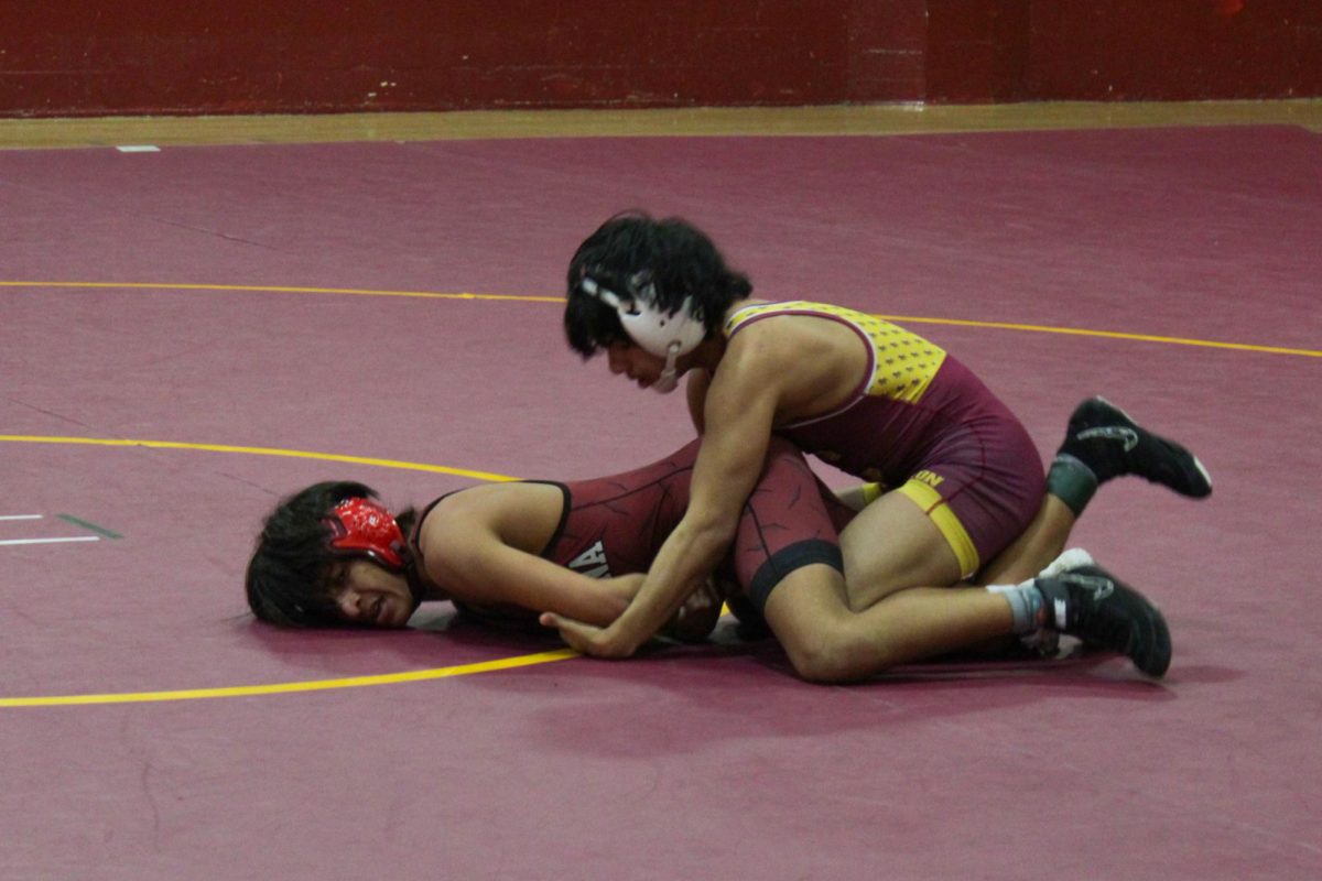 Elias Velasquez gets his opponent from Fontana to submit during their match on Jan. 10.