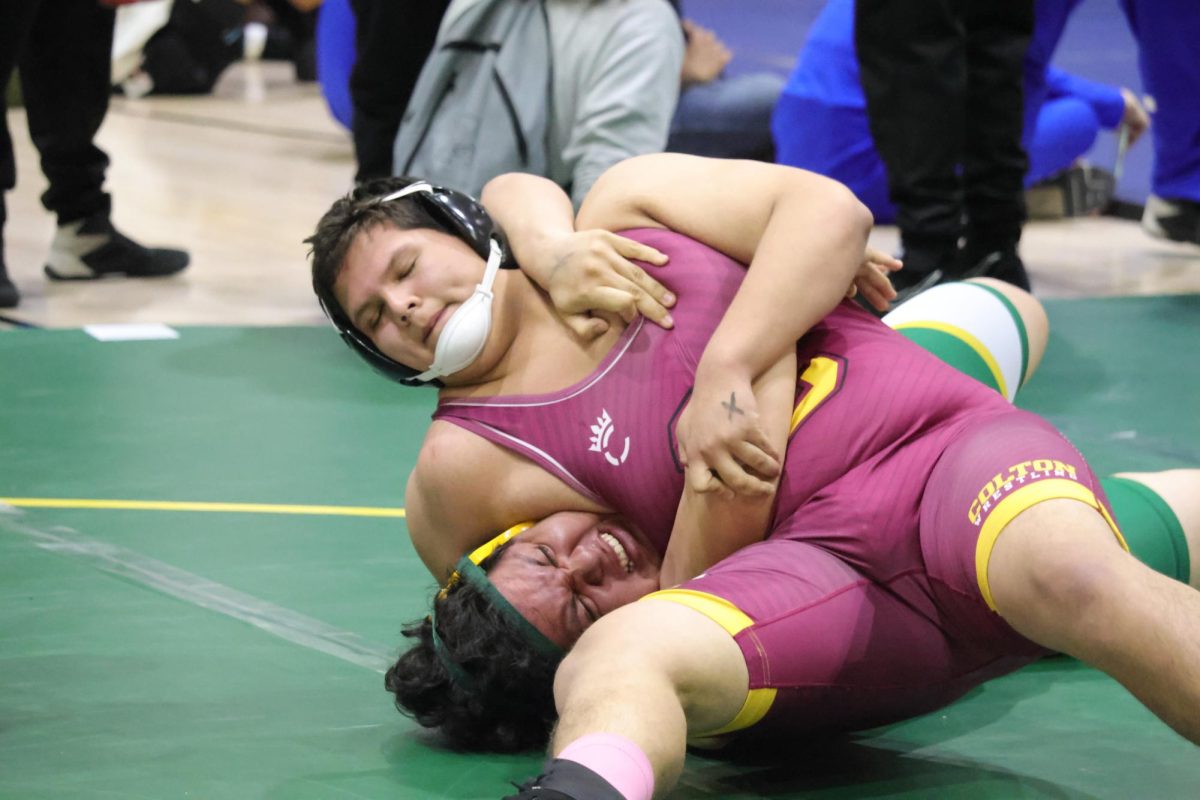 Steven Ornelas puts the finishing touches on his opponent from Eisenhower as he seals his league title for the 2023-2024 year.