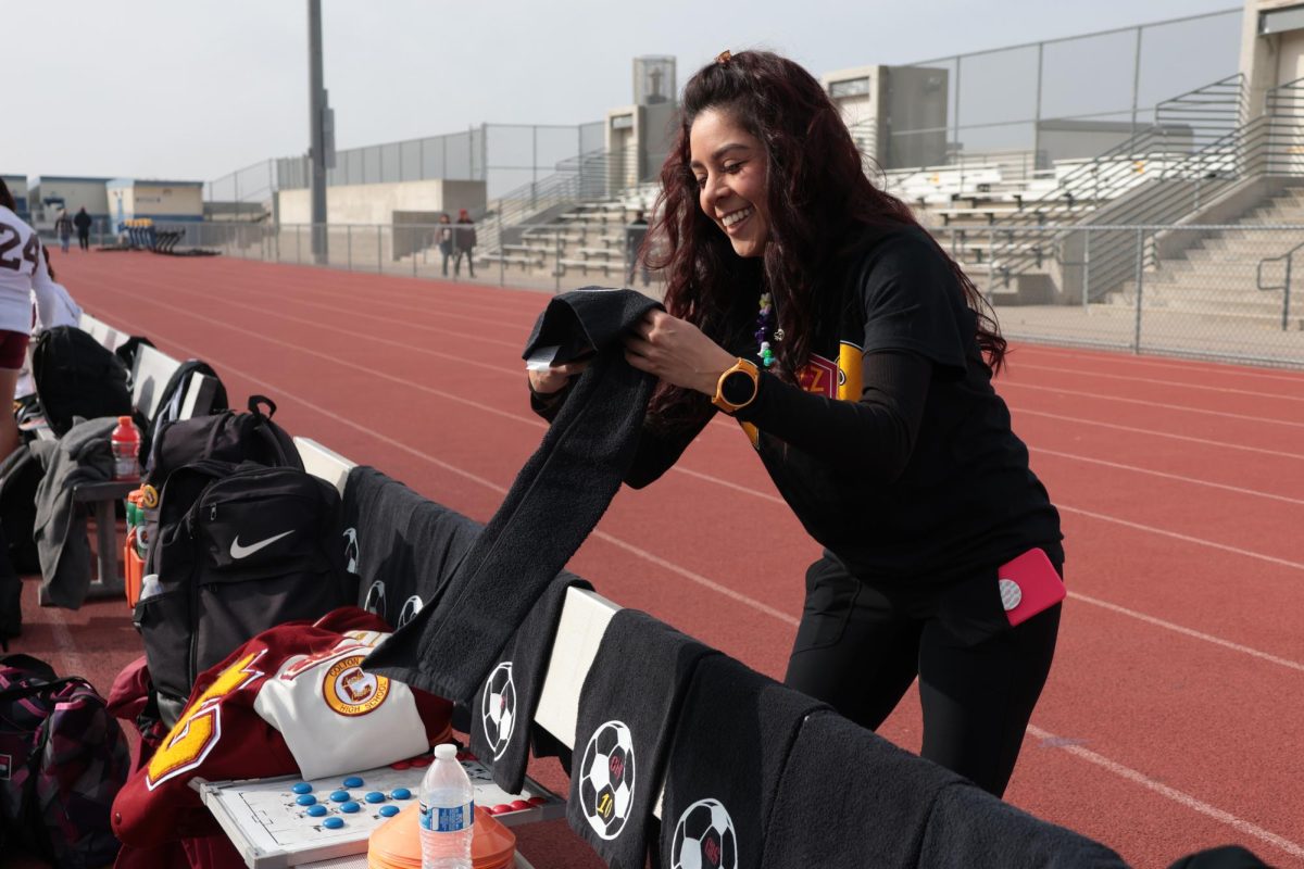 The night before the big game, athletic trainer Jo Garcia made special, customized towels for the girls soccer players. Each towel commemorated their CIF run and featured their jersey number.