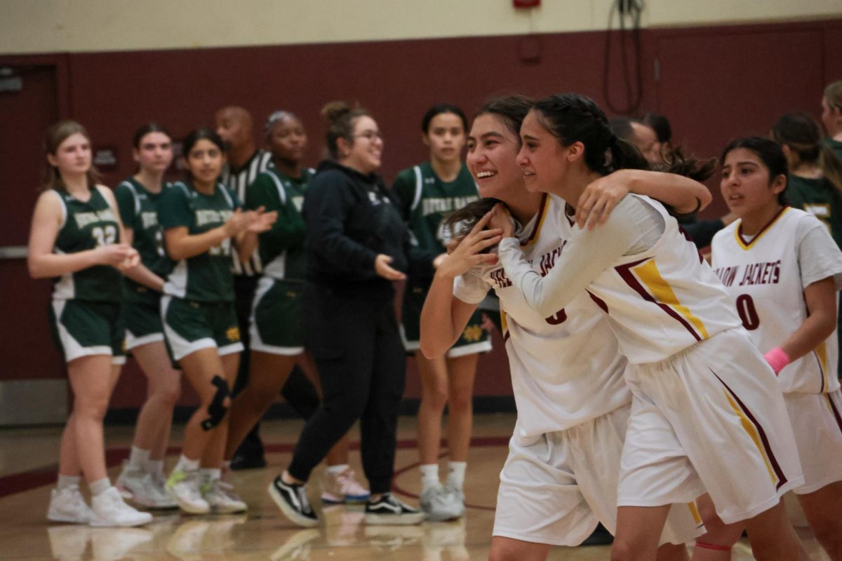 Its amazing! Jasmine Jimenez expresses her feelings about winning the Skyline League championship as she and Madison Prieto rush to celebrate with their team.