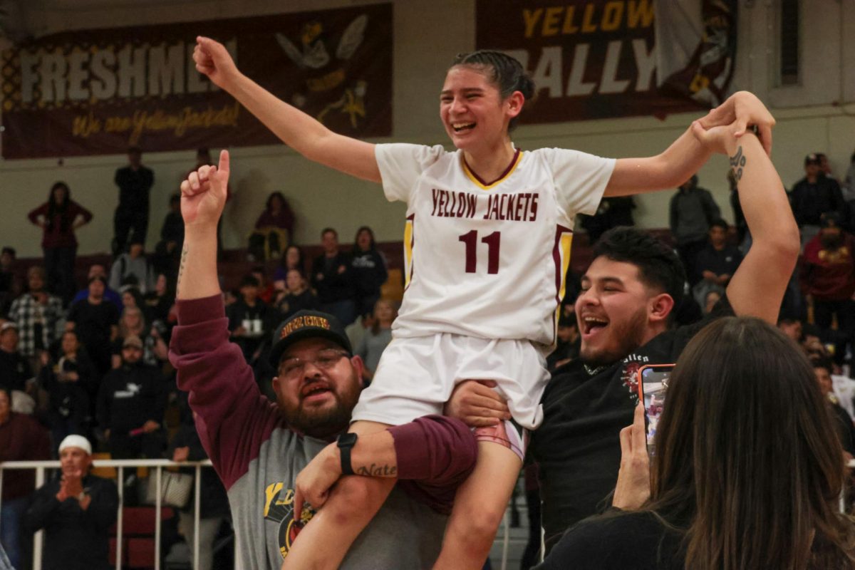 Nothing feels as great as being a champion, as evidenced by the look on Olivia Torres face as she is lifted by her dad and brother in celebration.