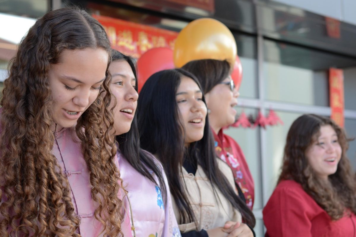 A choir of students from Ms. Lins Mandarin classes gathered on the outdoor MPR stage to sing Chinese songs in honor of the Lunar New Year.